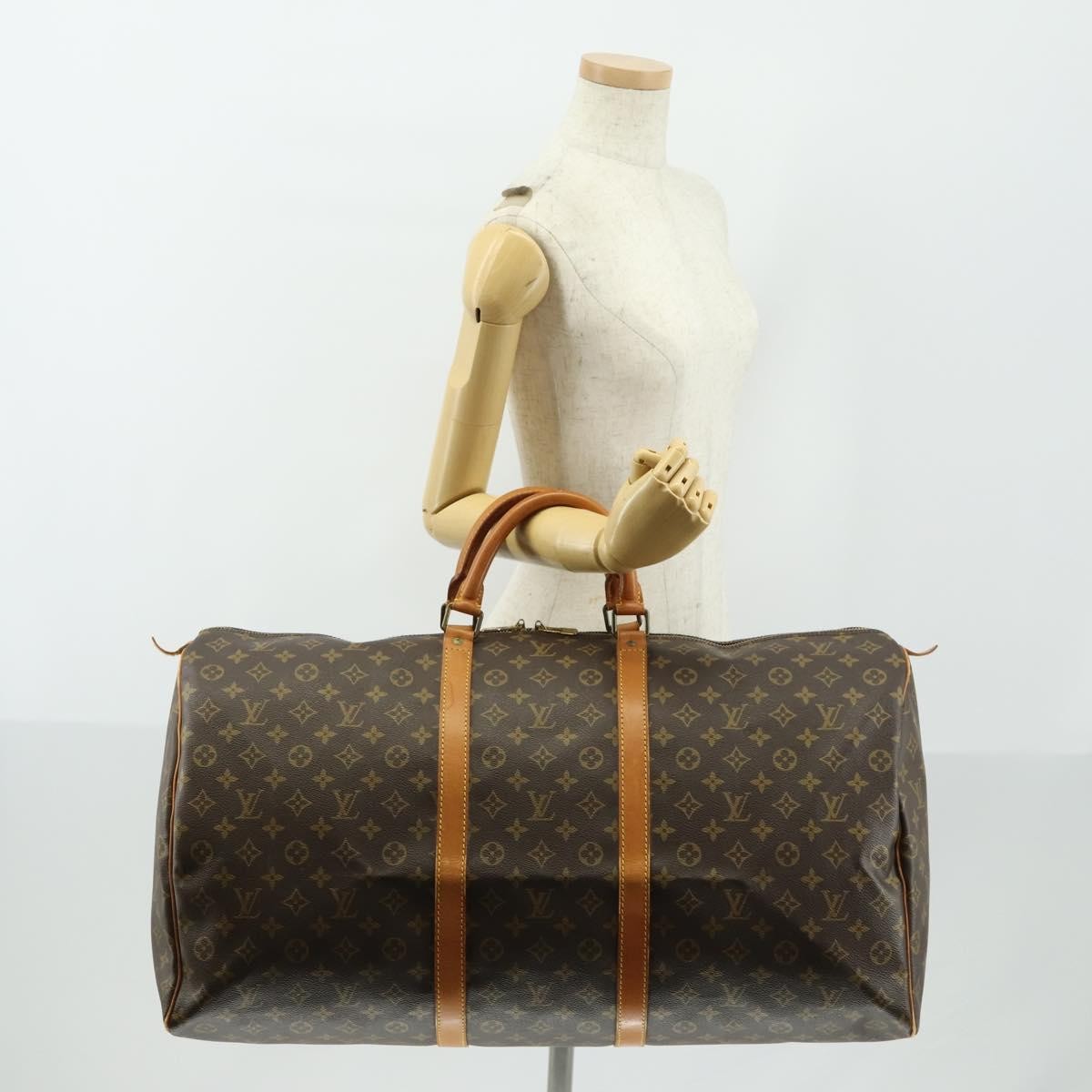 Louis Vuitton Keepall Monogram Canvas Brown Canvas Travel Bag Bag (Pre-Owned)