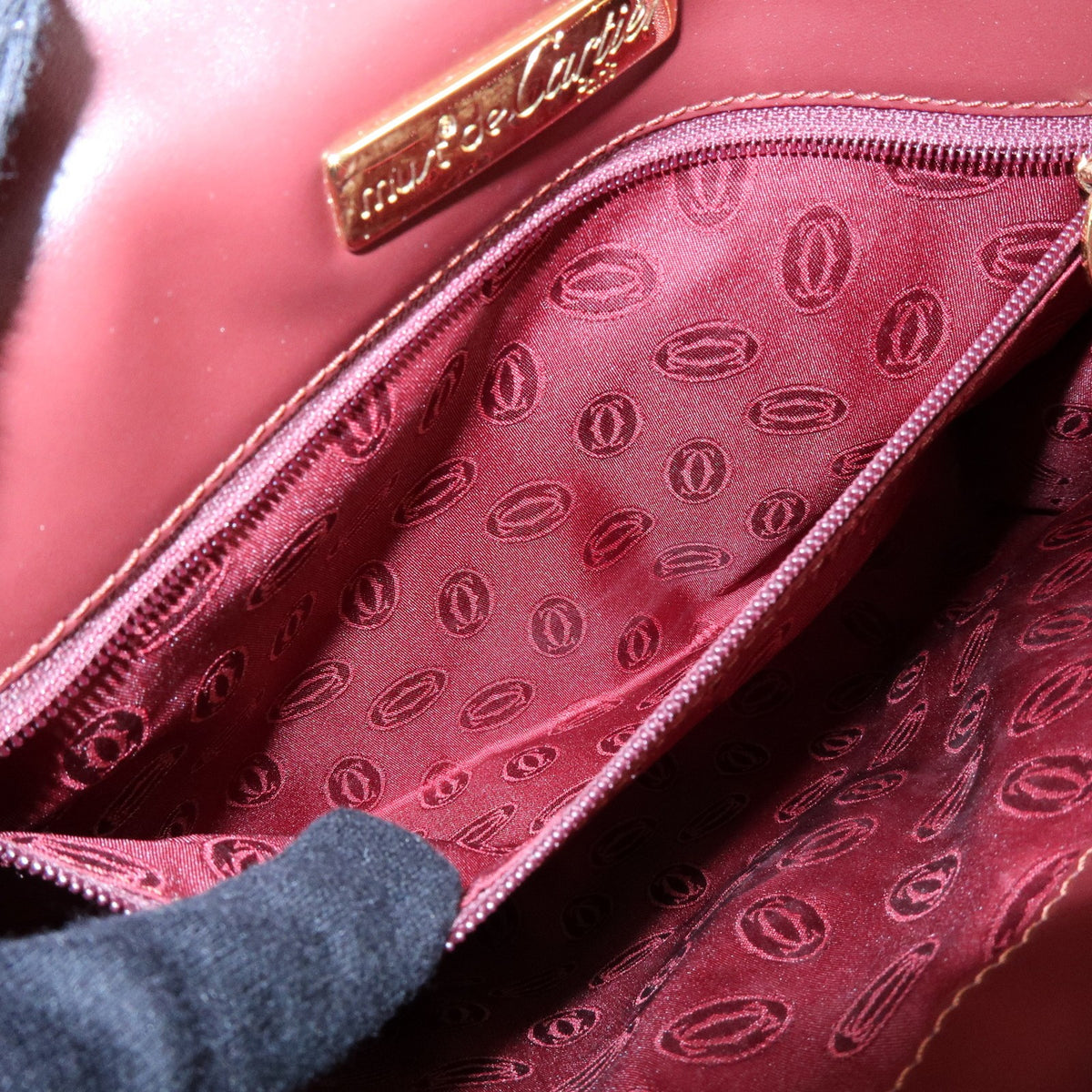 Cartier Must De Cartier Clutch Leather Burgundy Leather Clutche & Pouche Bag (Pre-Owned)