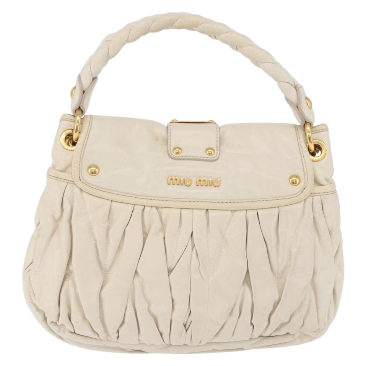 Miu Miu Coffer Hobo Matelasse Leather Beige Leather Handbag (Pre-Owned)