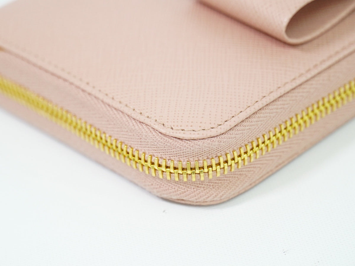 Prada Bow Zip Around Saffiano Leather Pink Leather Wallets Accessory (Pre-Owned)