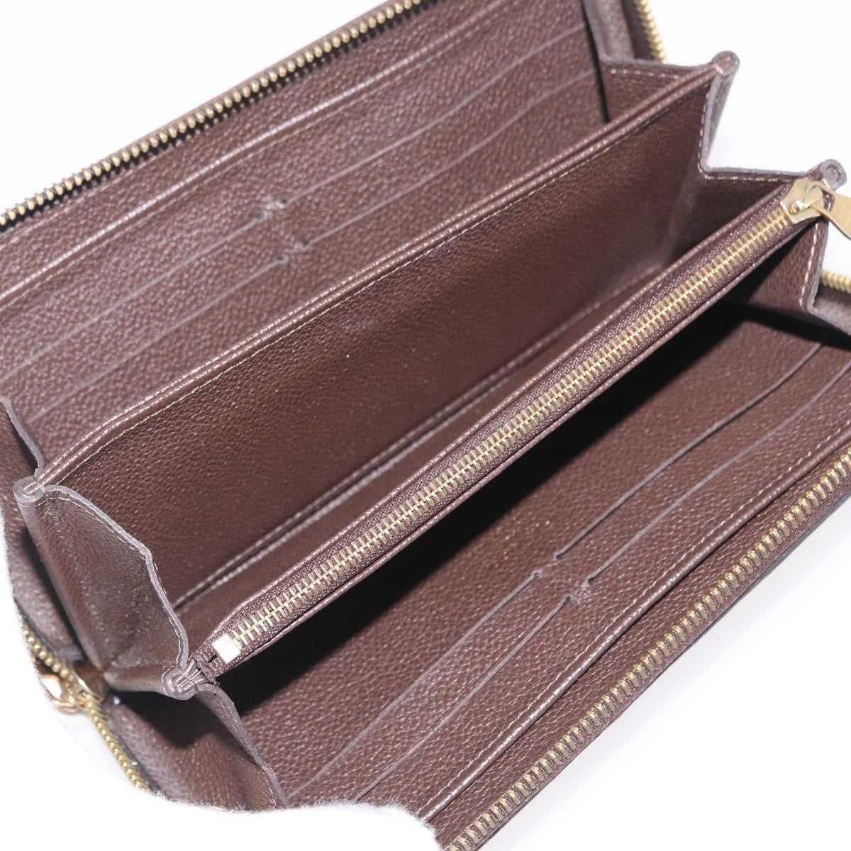 Louis Vuitton Portefeuille Zippy Monogramme Empreinte Monogramme Empreinte Brown Leather Wallets Accessory (Pre-Owned)