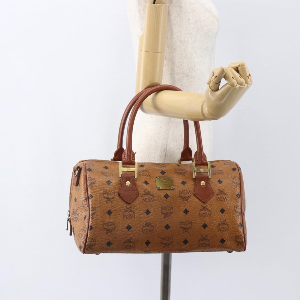 MCM Visetos Logogramme Canvas And Leather Brown Canvas Travel Bag Bag (Pre-Owned)