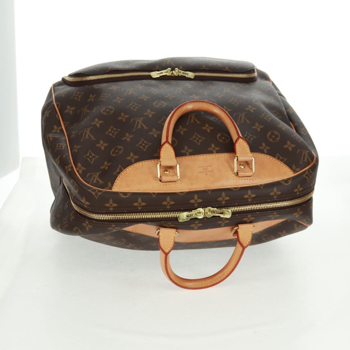 Louis Vuitton Evasion Monogram Canvas Brown Canvas Travel Bag Bag (Pre-Owned)