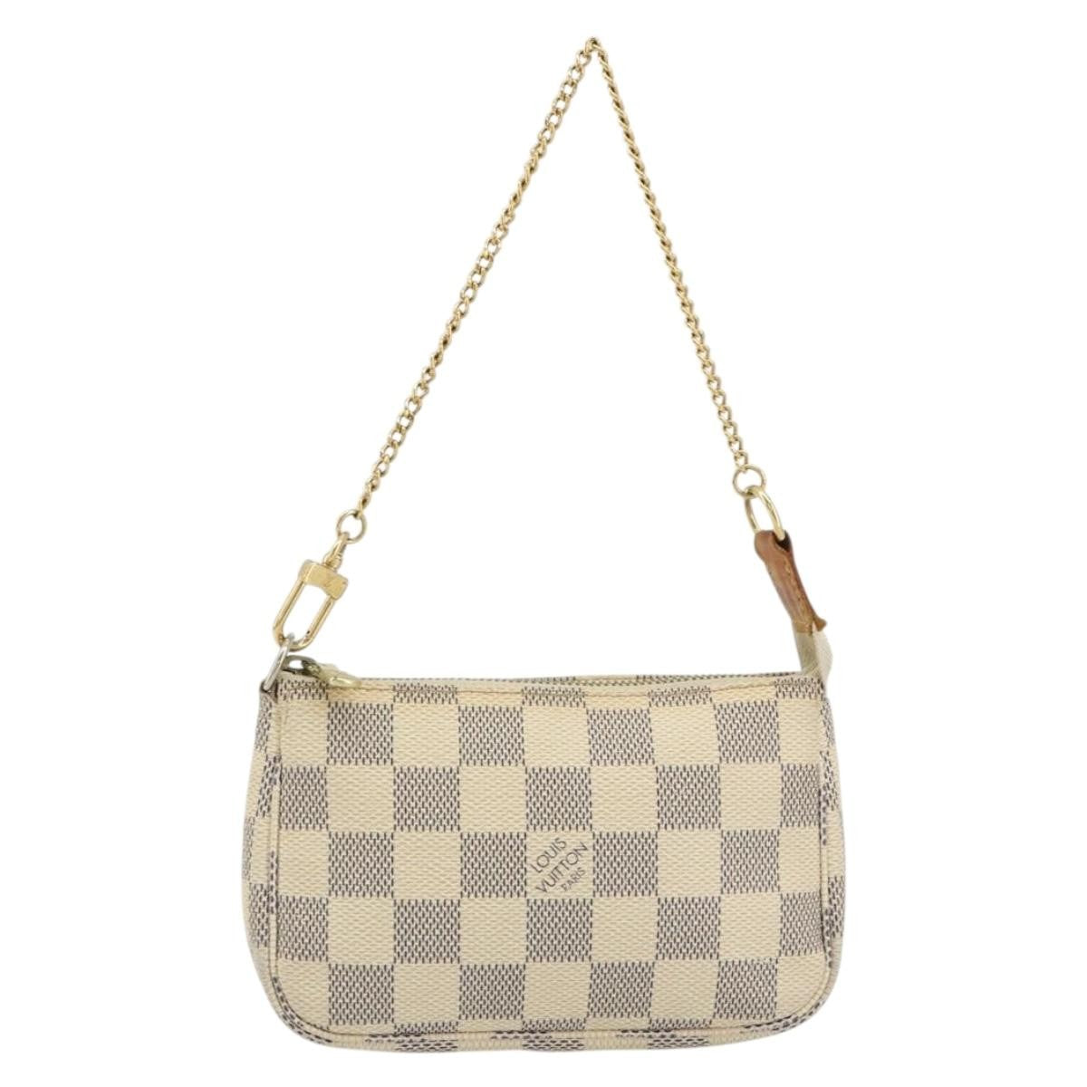 Louis Vuitton Mini Pochette Accessoires Damier Canvas Beige Canvas Clutche & Pouche Bag (Pre-Owned)