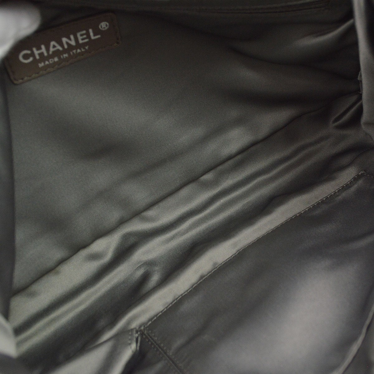 Chanel Drill Flap Perforated Leather Metallic Leather Handbag (Pre-Owned)
