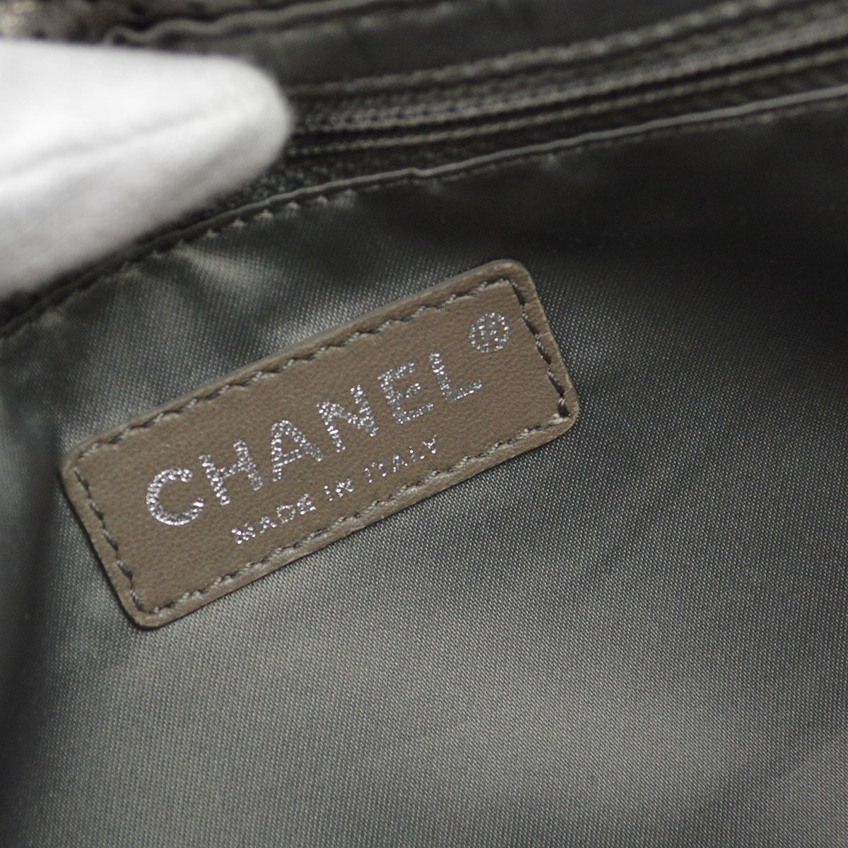 Chanel Drill Flap Perforated Leather Metallic Leather Handbag (Pre-Owned)