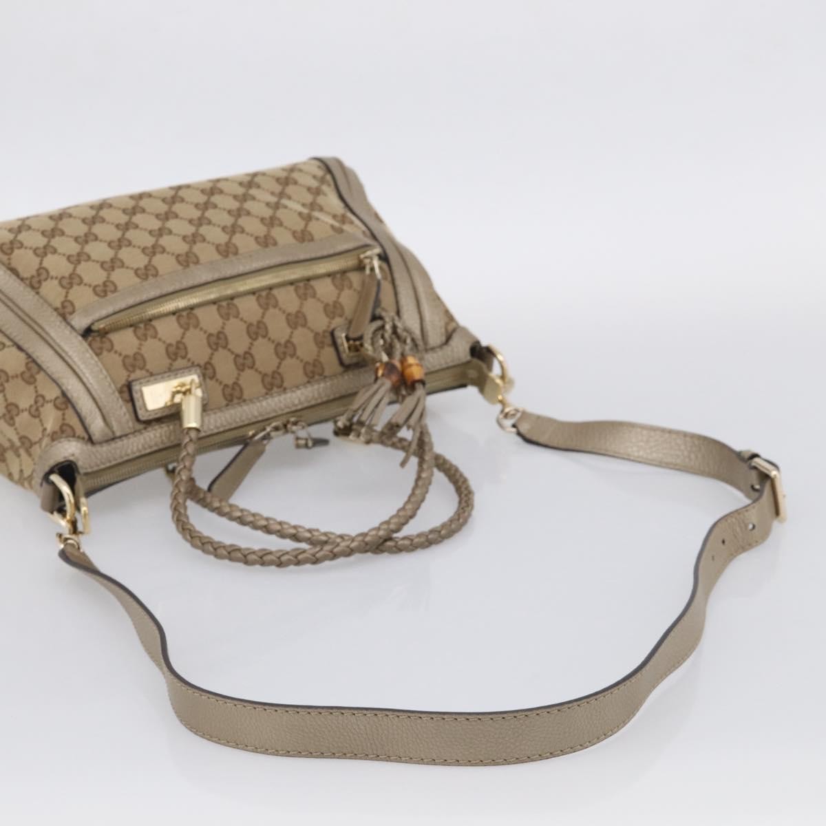 Gucci Bella Convertible Top Handle Gg Canvas Beige Canvas Handbag (Pre-Owned)
