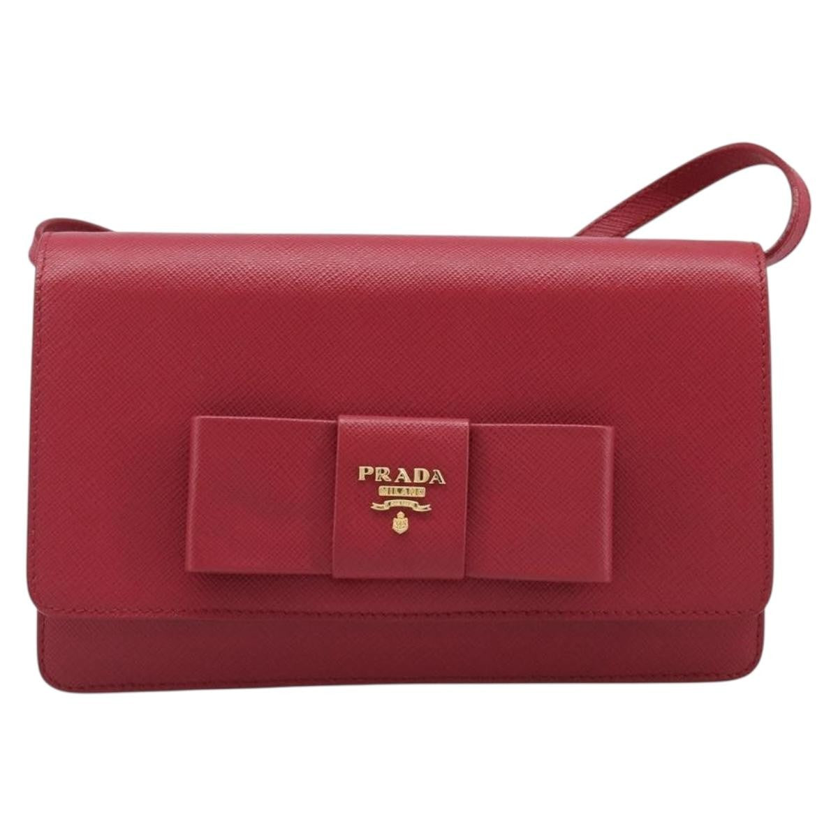 Prada Bow Wallet On Strap Saffiano Leather Red Leather Crossbody Bag Bag (Pre-Owned)