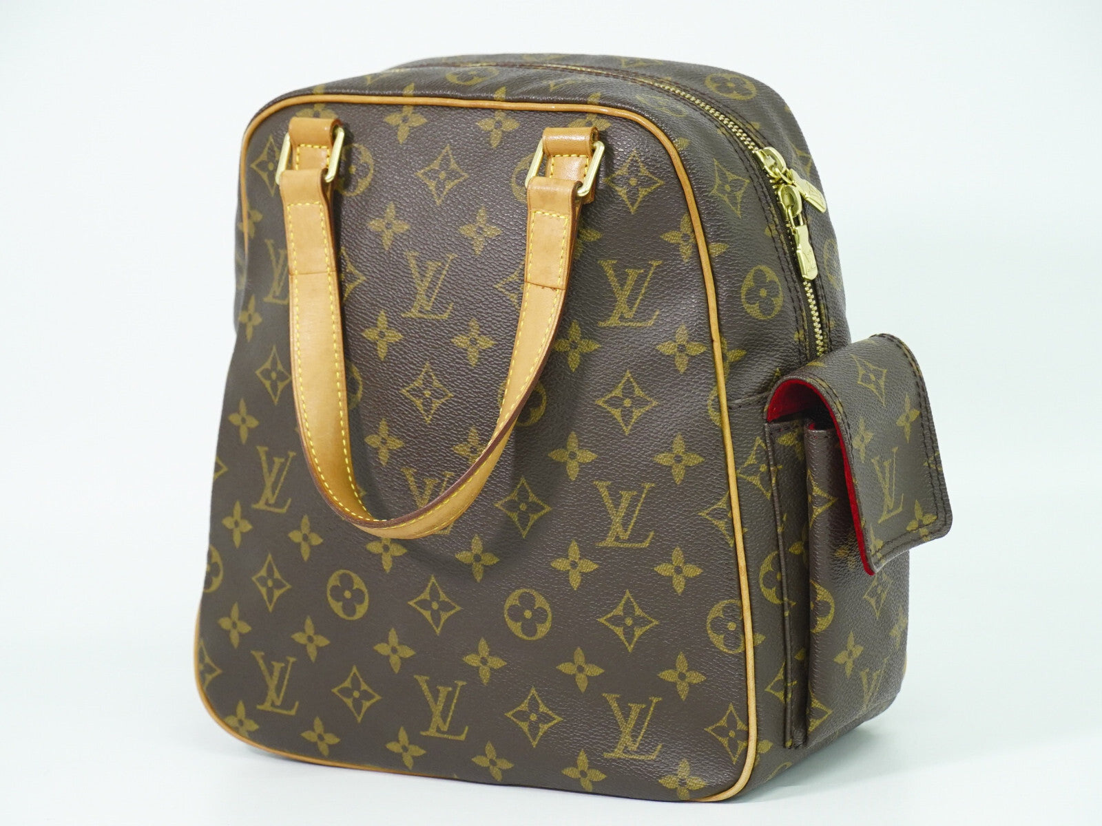 Louis Vuitton Excentri-Cite Monogram Canvas Brown Canvas Handbag (Pre-Owned)