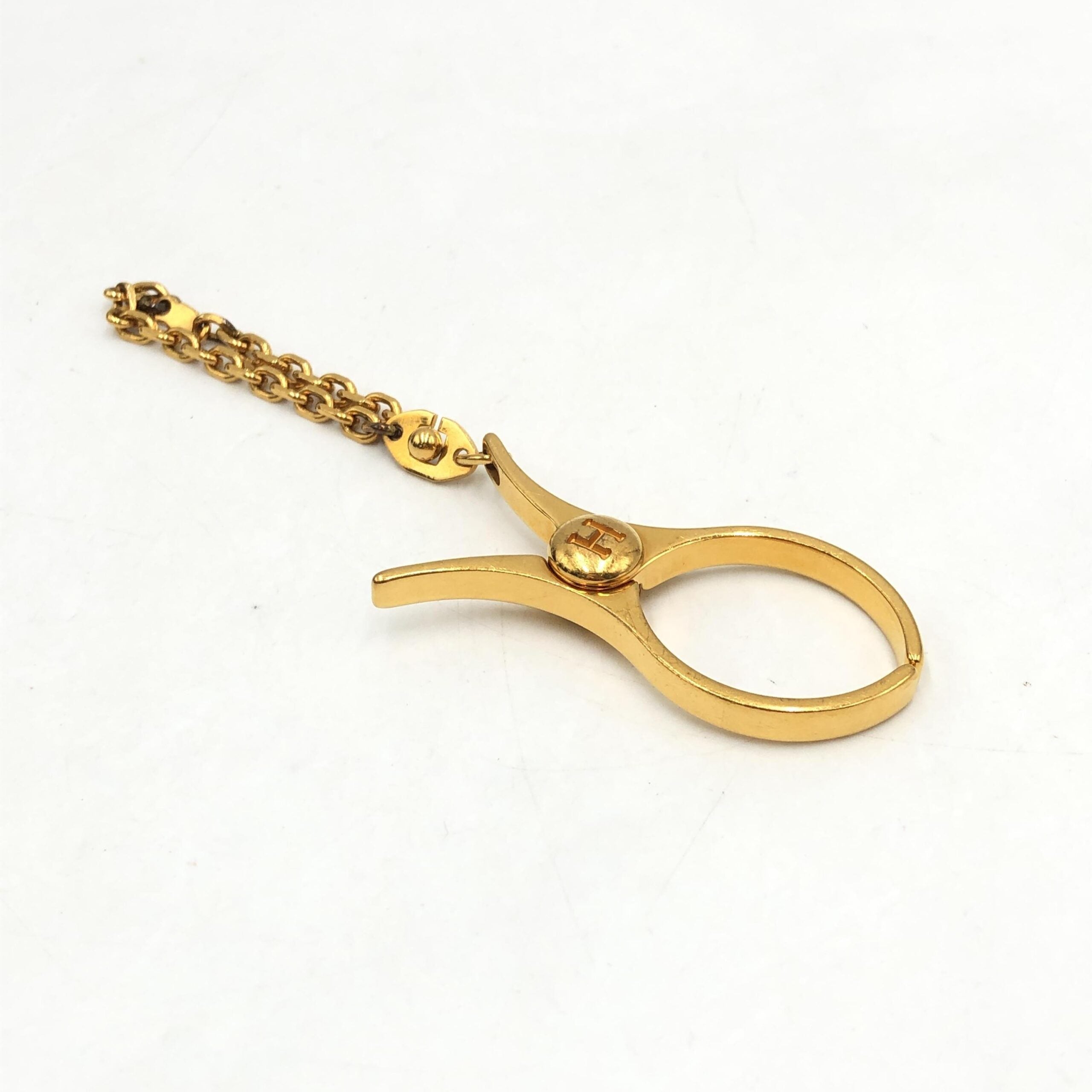 Hermès Gold Metal Glove Holder Women's Keychain (Pre-Owned)