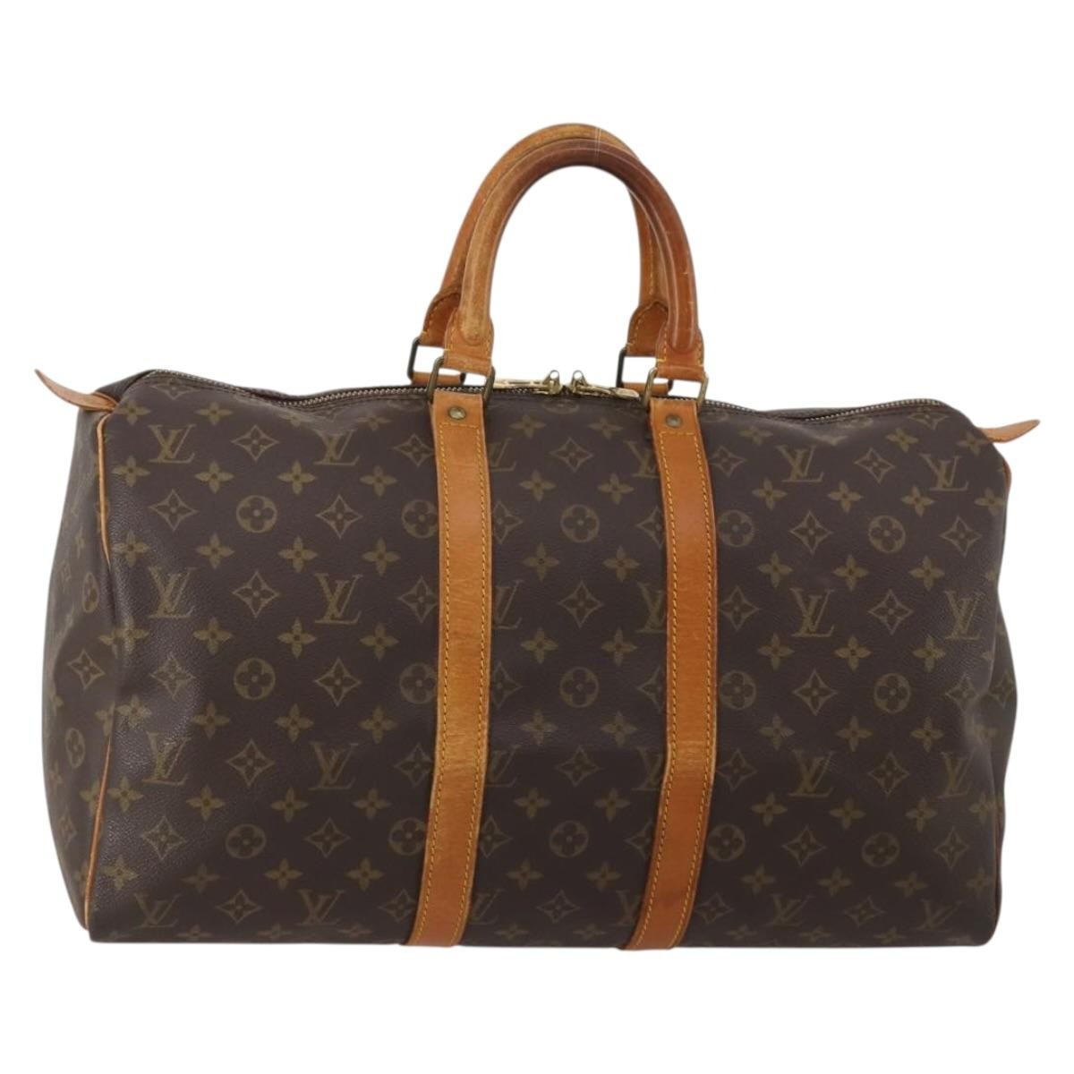 Louis Vuitton Keepall Monogram Brown Canvas Travel Bag Bag (Pre-Owned)