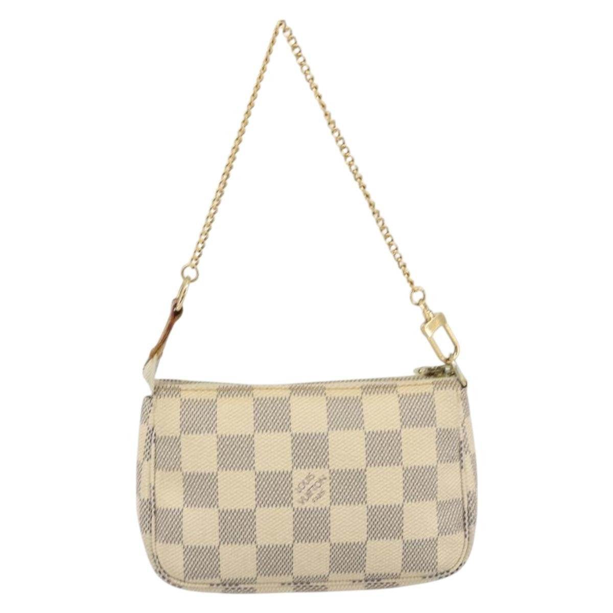 Louis Vuitton Mini Pochette Accessoires Damier Canvas Beige Canvas Clutche & Pouche Bag (Pre-Owned)