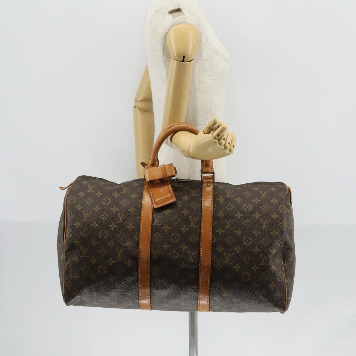 Louis Vuitton Keepall Monogram Canvas Brown Canvas Travel Bag Bag (Pre-Owned)