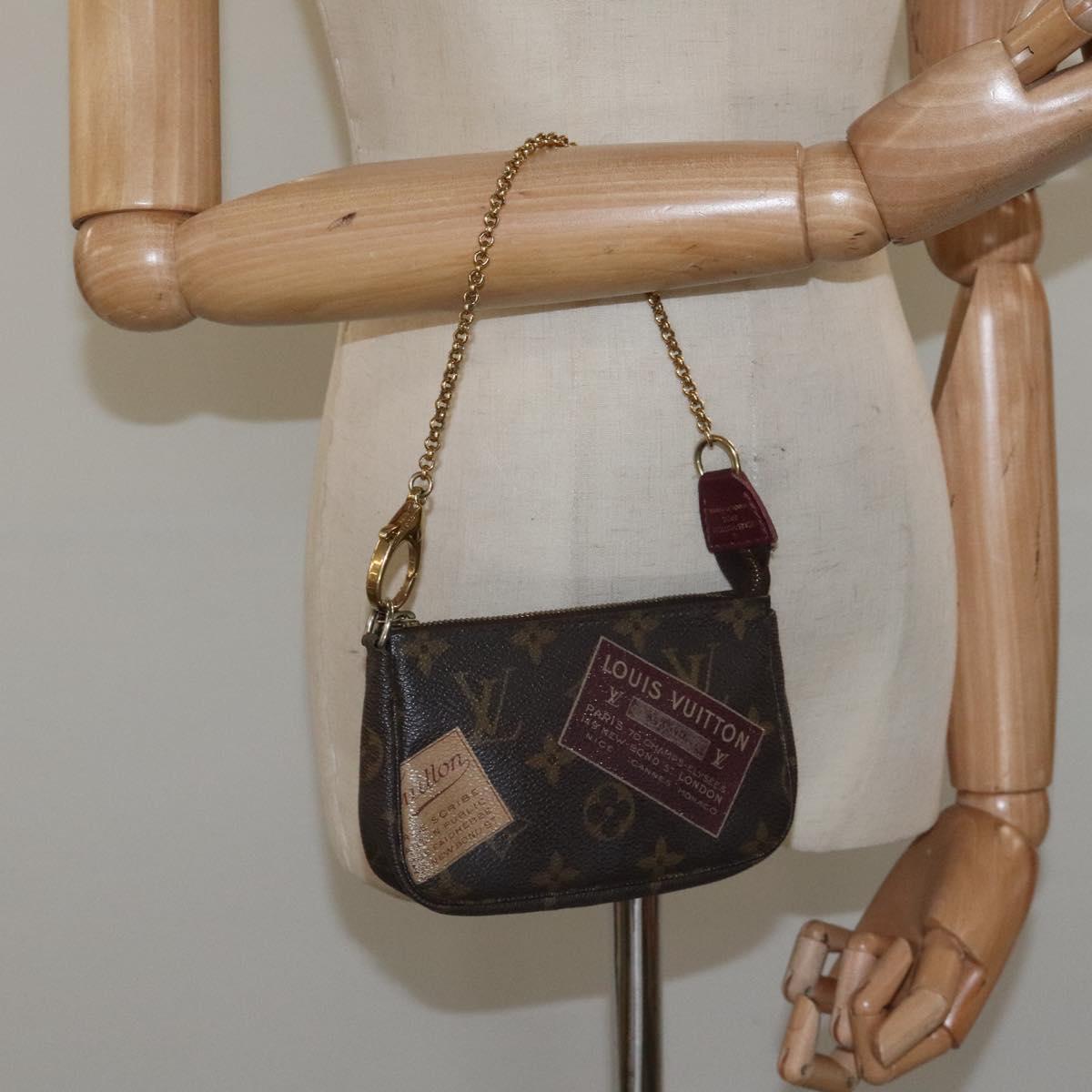 Louis Vuitton Mini Pochette Accessoires Brown Canvas Clutch Bag (Pre-Owned)