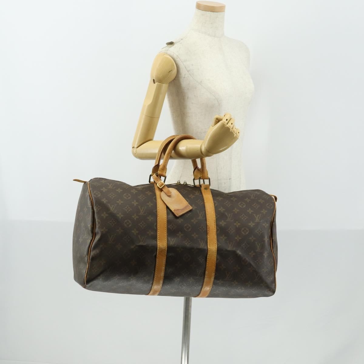 Louis Vuitton Keepall Monogram Canvas Brown Canvas Travel Bag Bag (Pre-Owned)