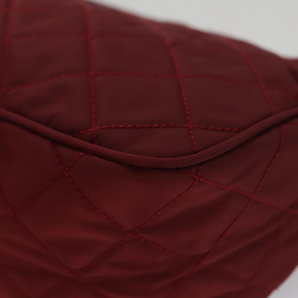 Prada Matelassé Burgundy Synthetic Clutch Bag (Pre-Owned)