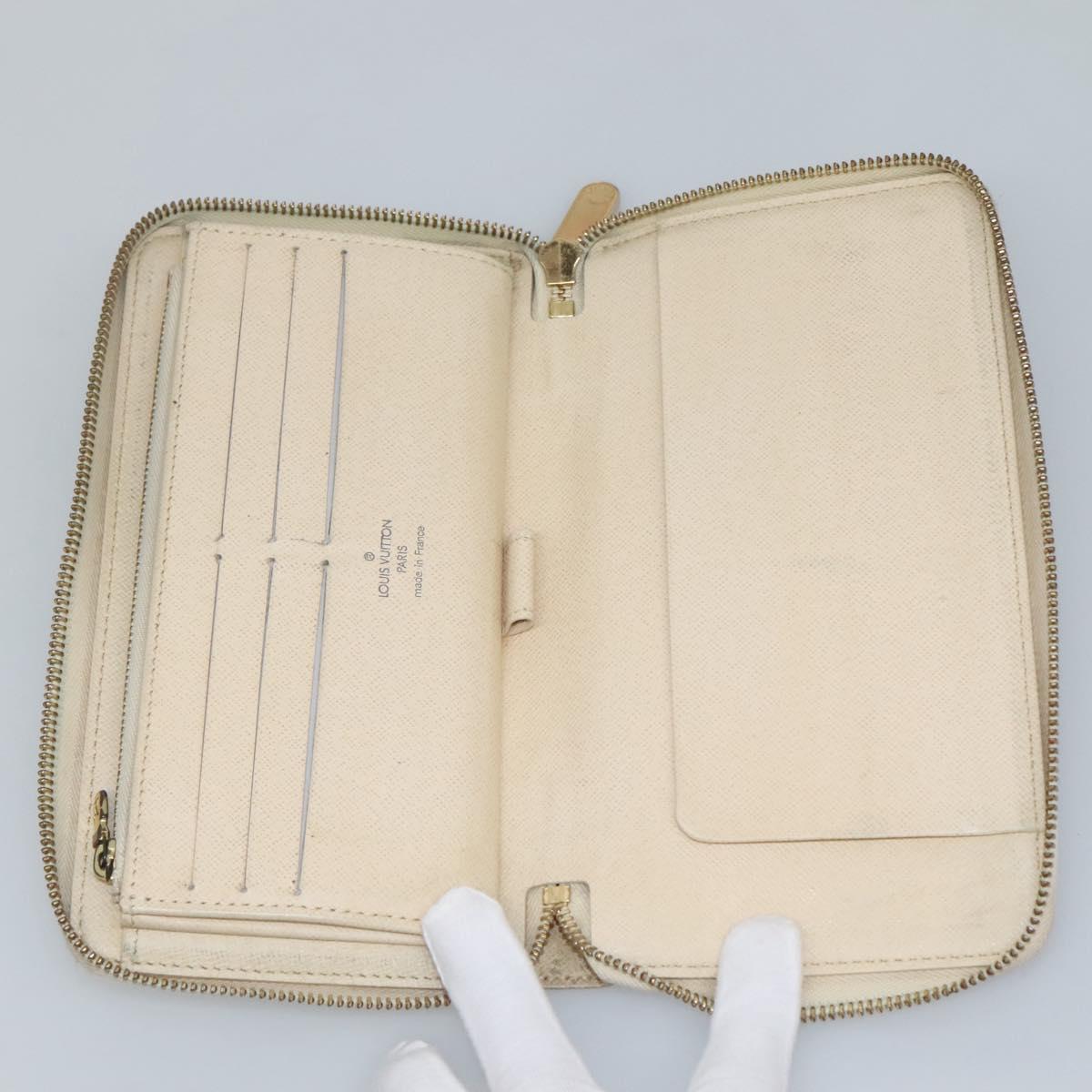 Louis Vuitton Zippy Organizer White Canvas Wallet (Pre-Owned)