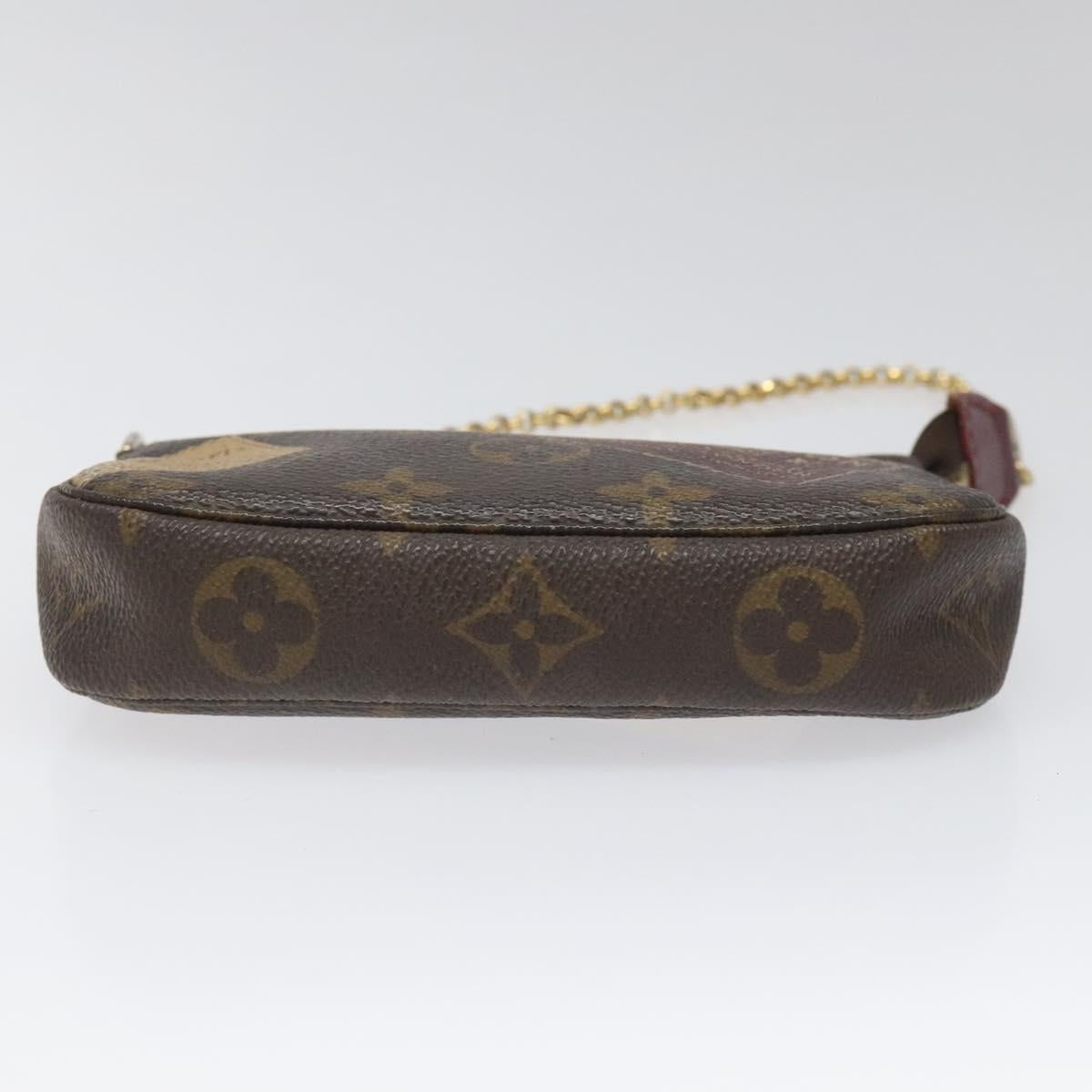 Louis Vuitton Mini Pochette Accessoires Brown Canvas Clutch Bag (Pre-Owned)