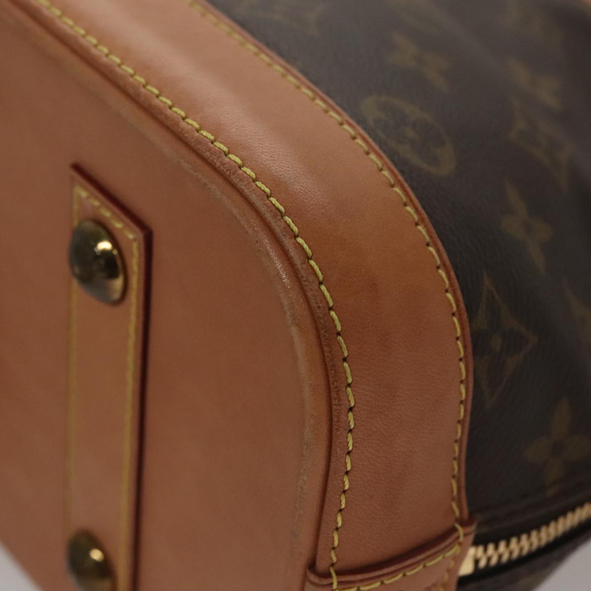 Louis Vuitton Alma Brown Canvas Handbag (Pre-Owned)