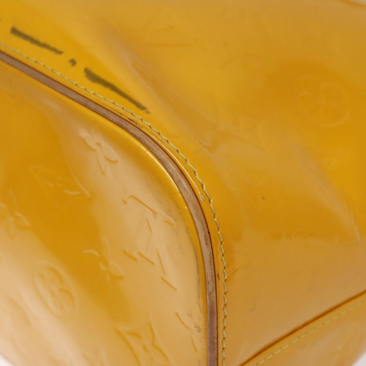 Louis Vuitton Houston Yellow Patent Leather Handbag (Pre-Owned)