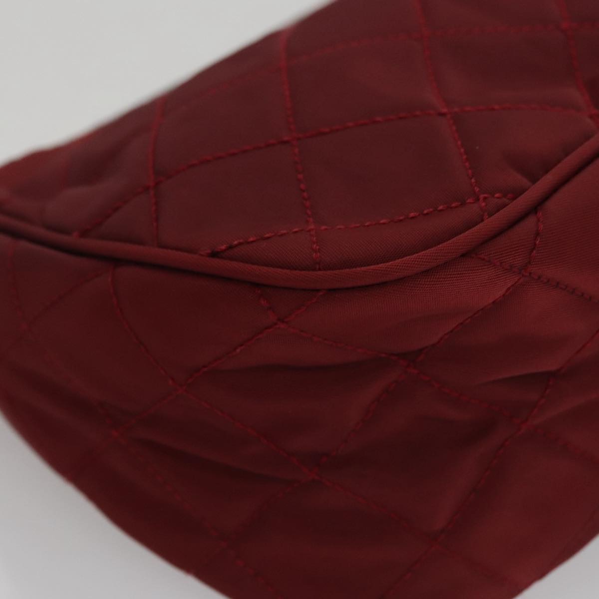 Prada Matelassé Burgundy Synthetic Clutch Bag (Pre-Owned)
