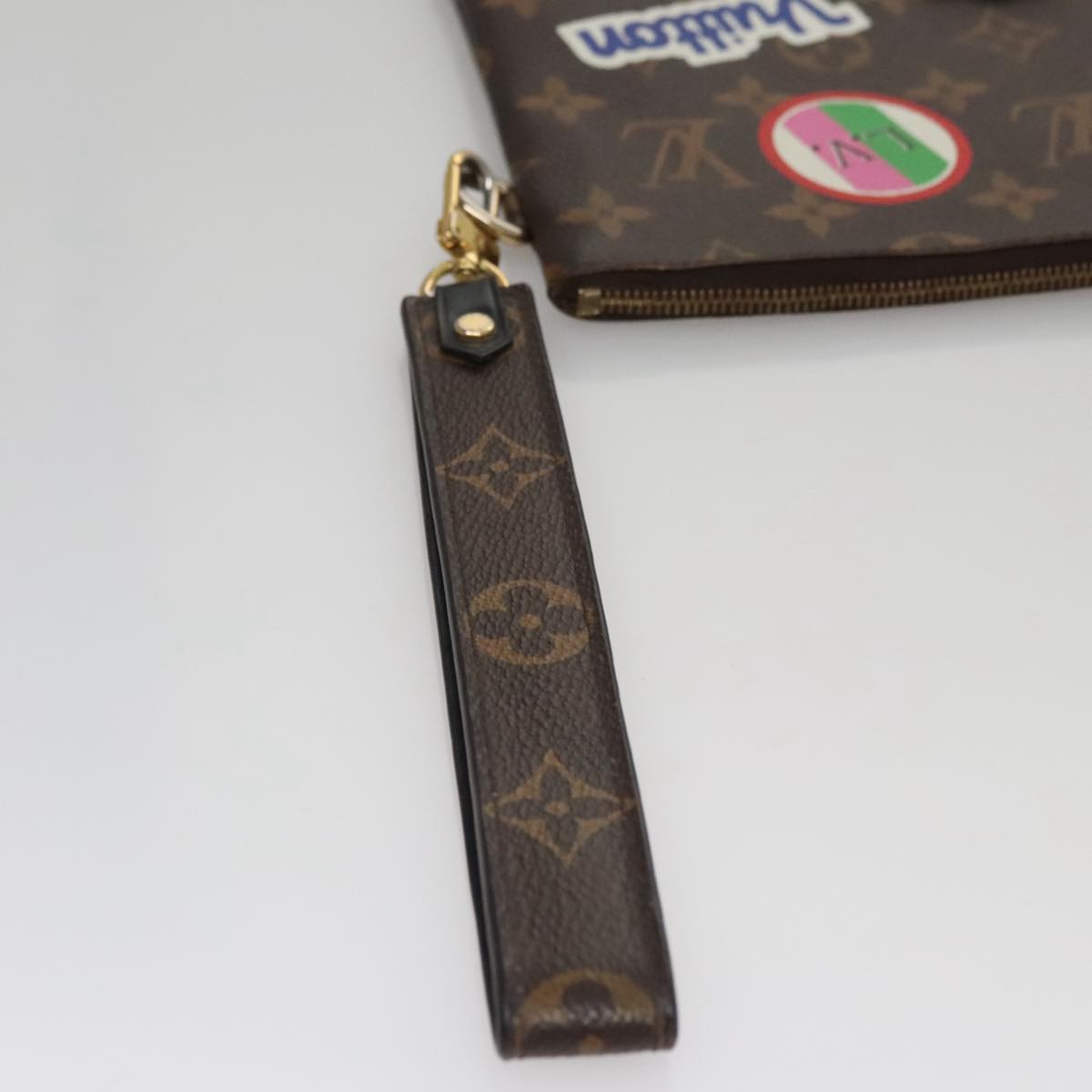 Louis Vuitton City Brown Canvas Clutch Bag (Pre-Owned)