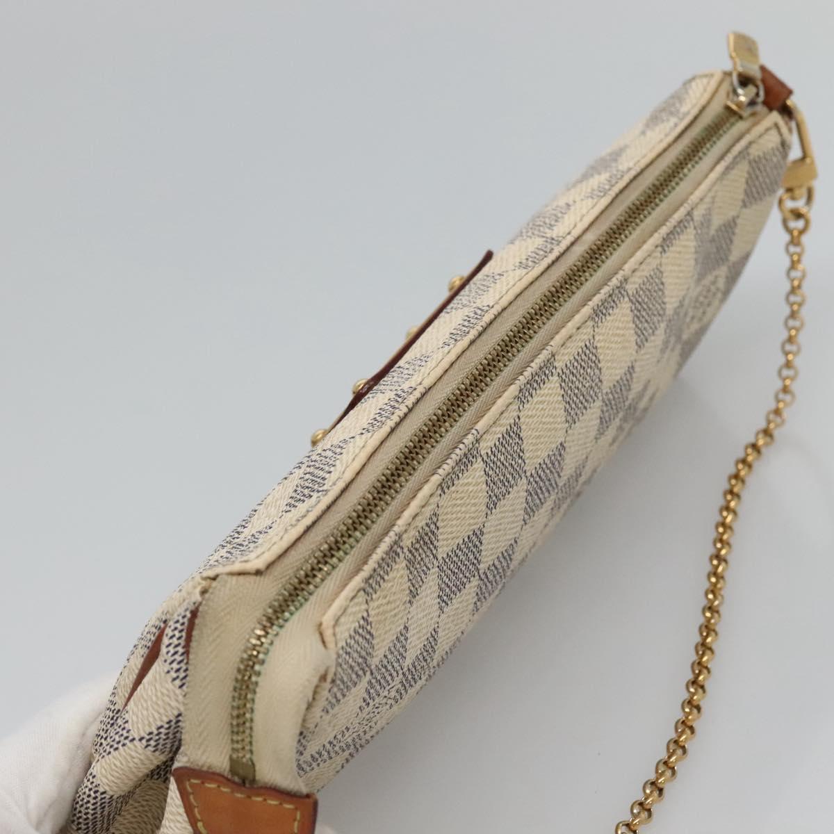 Louis Vuitton Eva White Canvas Shoulder Bag (Pre-Owned)