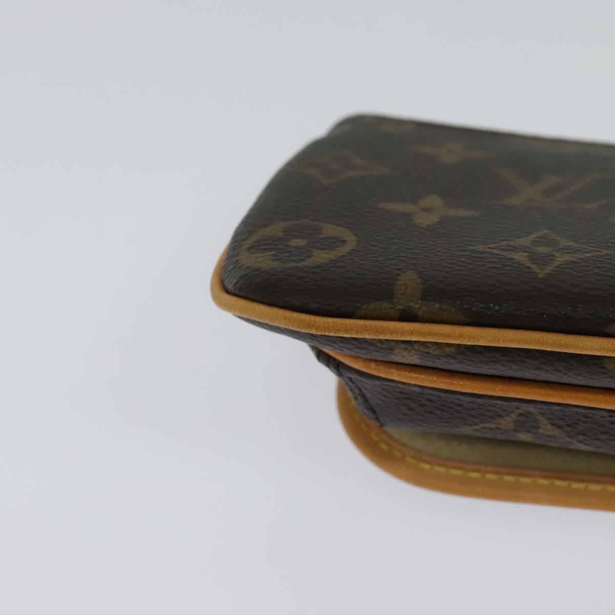 Louis Vuitton Tikal Brown Canvas Clutch Bag (Pre-Owned)