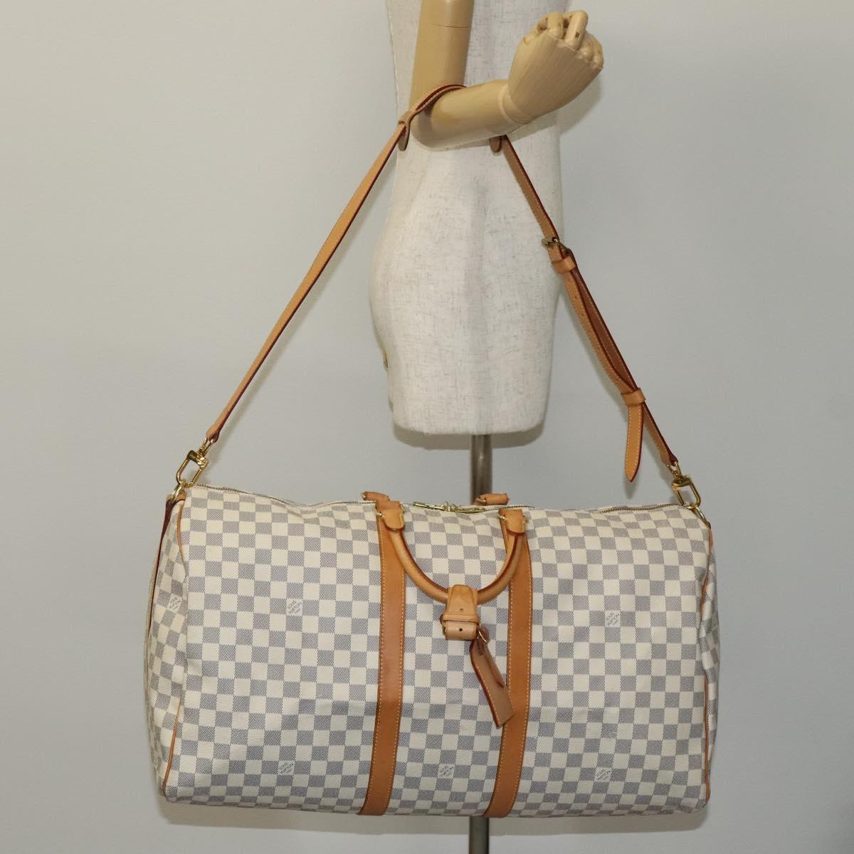 Louis Vuitton Keepall Bandouliere 55 White Canvas Travel Bag (Pre-Owned)