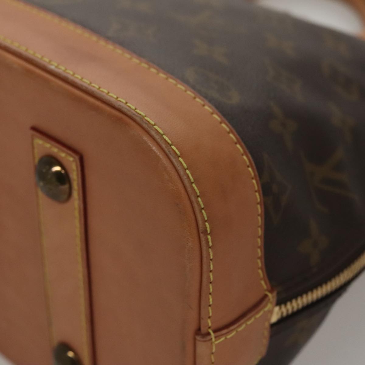 Louis Vuitton Alma Brown Canvas Handbag (Pre-Owned)