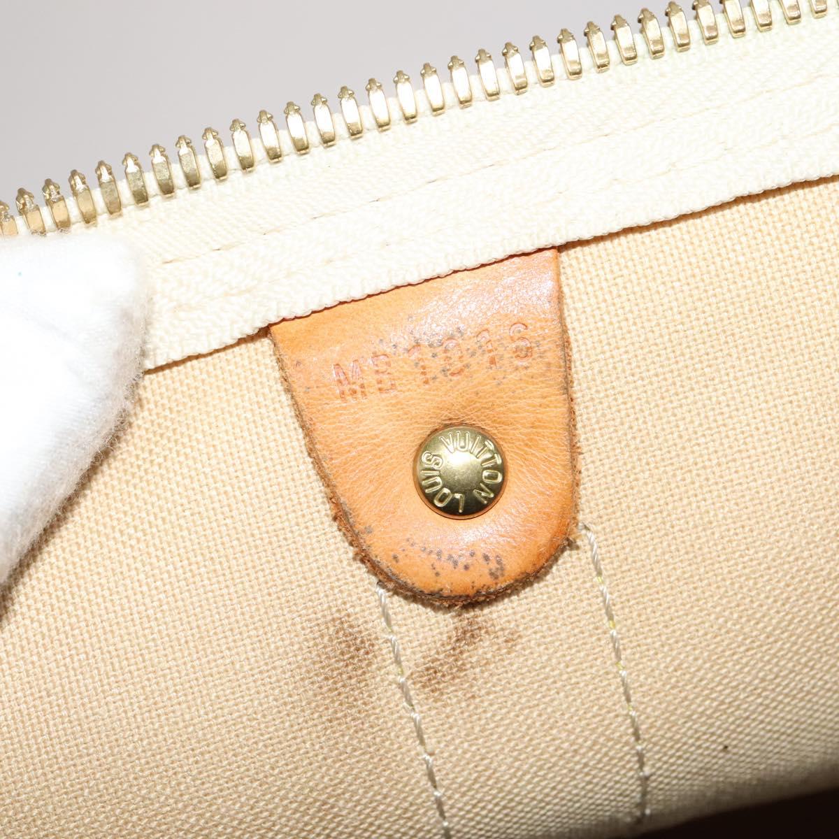 Louis Vuitton Keepall Bandouliere 55 White Canvas Travel Bag (Pre-Owned)