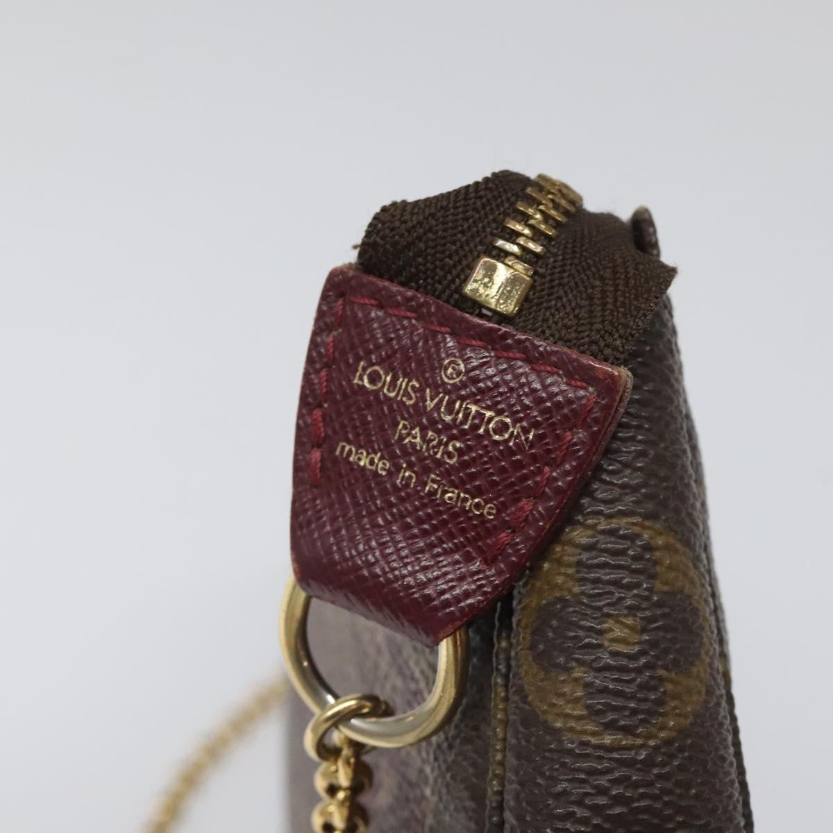 Louis Vuitton Mini Pochette Accessoires Brown Canvas Clutch Bag (Pre-Owned)