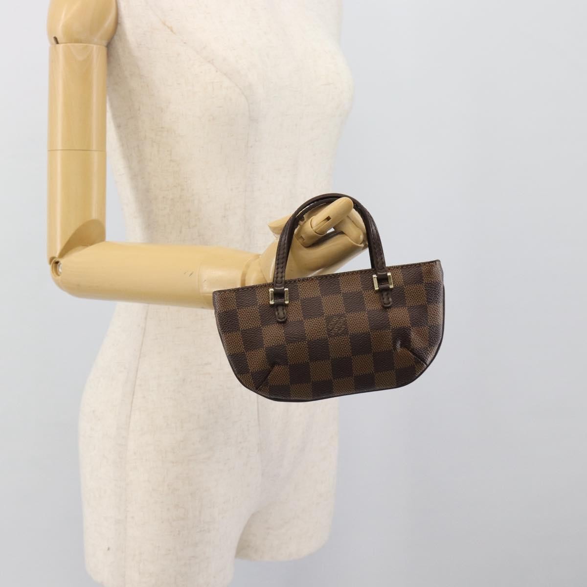 Louis Vuitton Manosque Pochette Damier Brown Canvas Clutche & Pouche Bag (Pre-Owned)