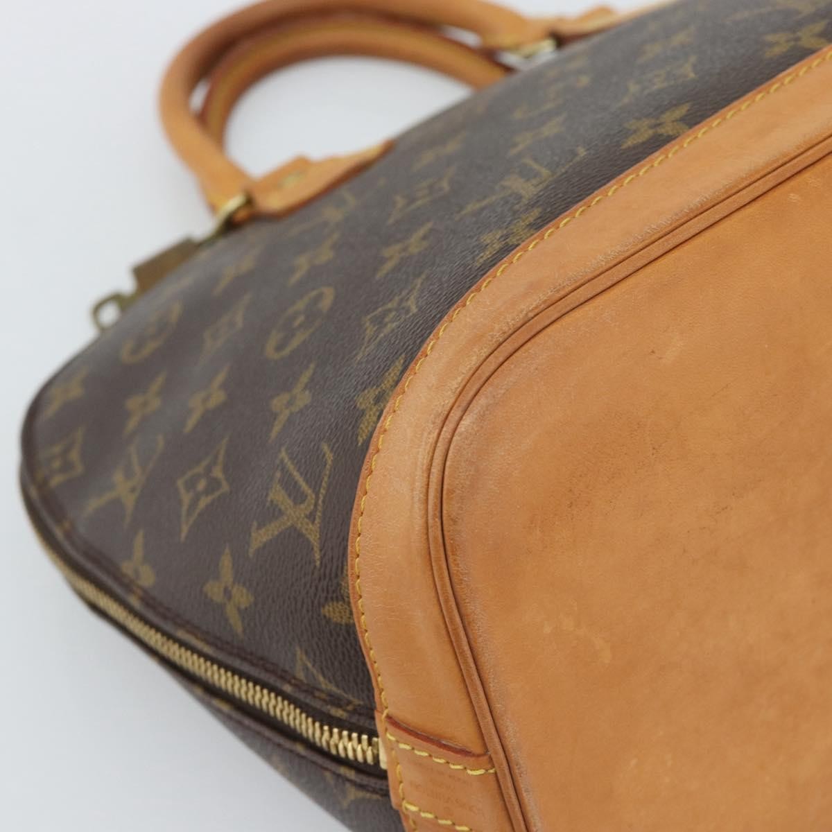 Louis Vuitton Alma Monogram Canvas Brown Canvas Handbag (Pre-Owned)