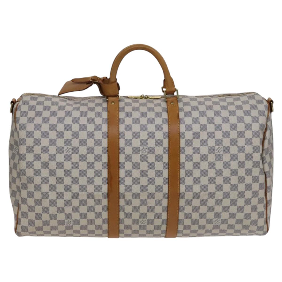 Louis Vuitton Keepall Bandouliere 55 White Canvas Travel Bag (Pre-Owned)