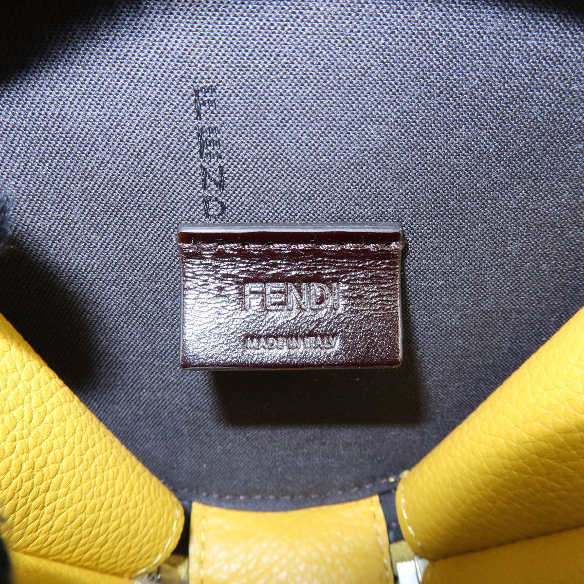 Fendi Vintage Ff Round Embossed Leather Yellow Leather Crossbody Bag Bag (Pre-Owned)