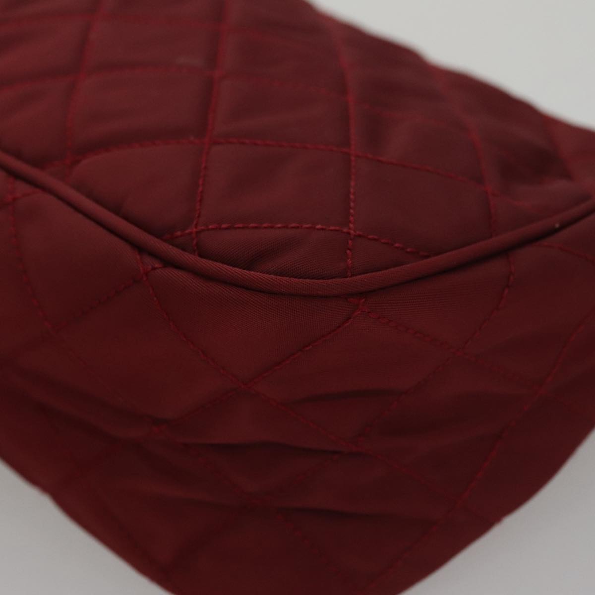 Prada Matelassé Burgundy Synthetic Clutch Bag (Pre-Owned)