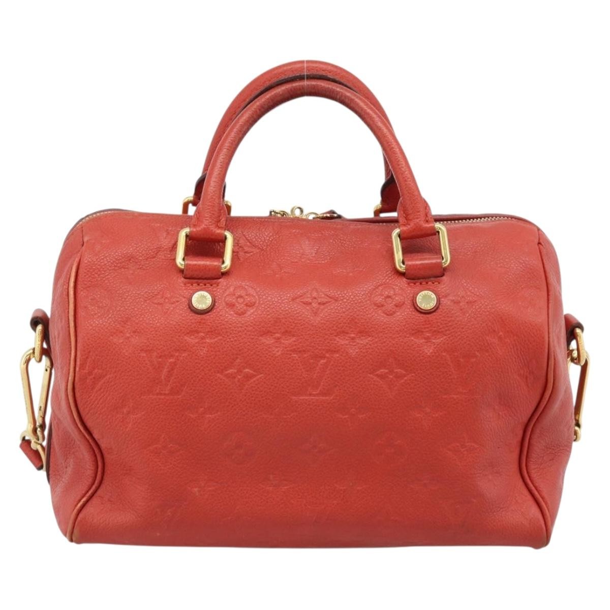 Louis Vuitton Speedy Bandouliere Monogram Empreinte Leather Red Leather Handbag (Pre-Owned)