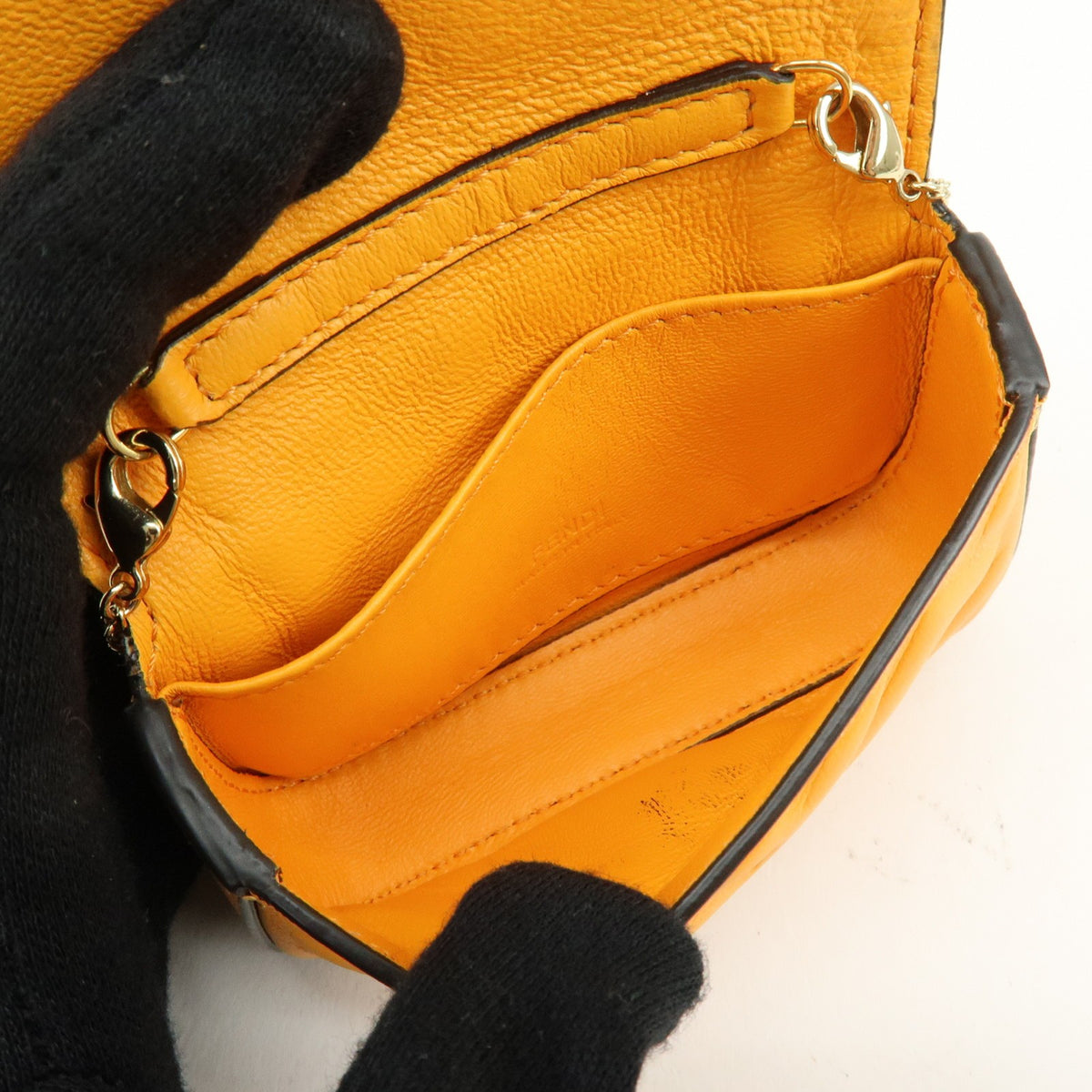 Fendi Chain Baguette Charm Zucca Embossed Leather Orange Leather Handbag (Pre-Owned)