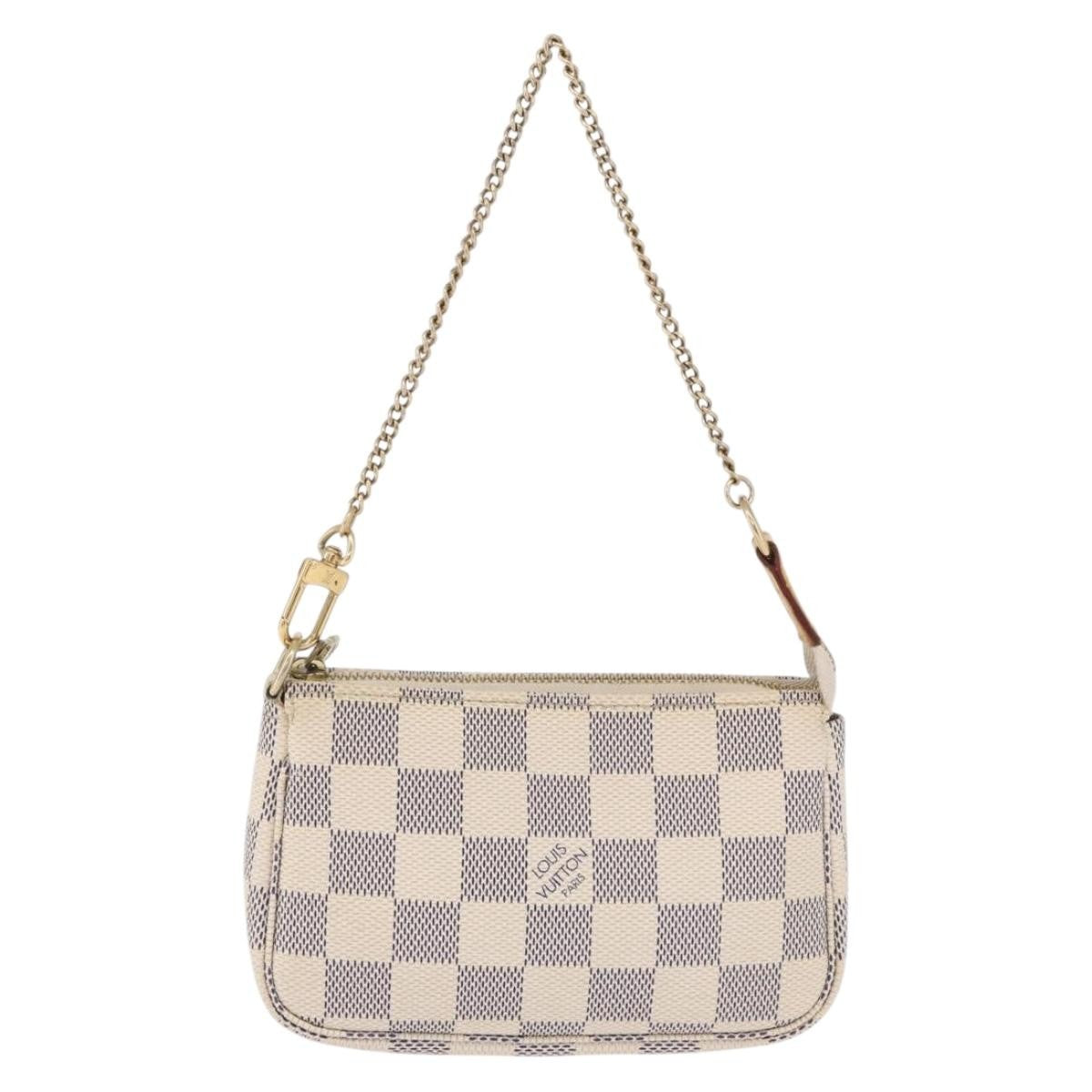 Louis Vuitton Mini Pochette Accessoires Damier Canvas Beige Canvas Clutche & Pouche Bag (Pre-Owned)