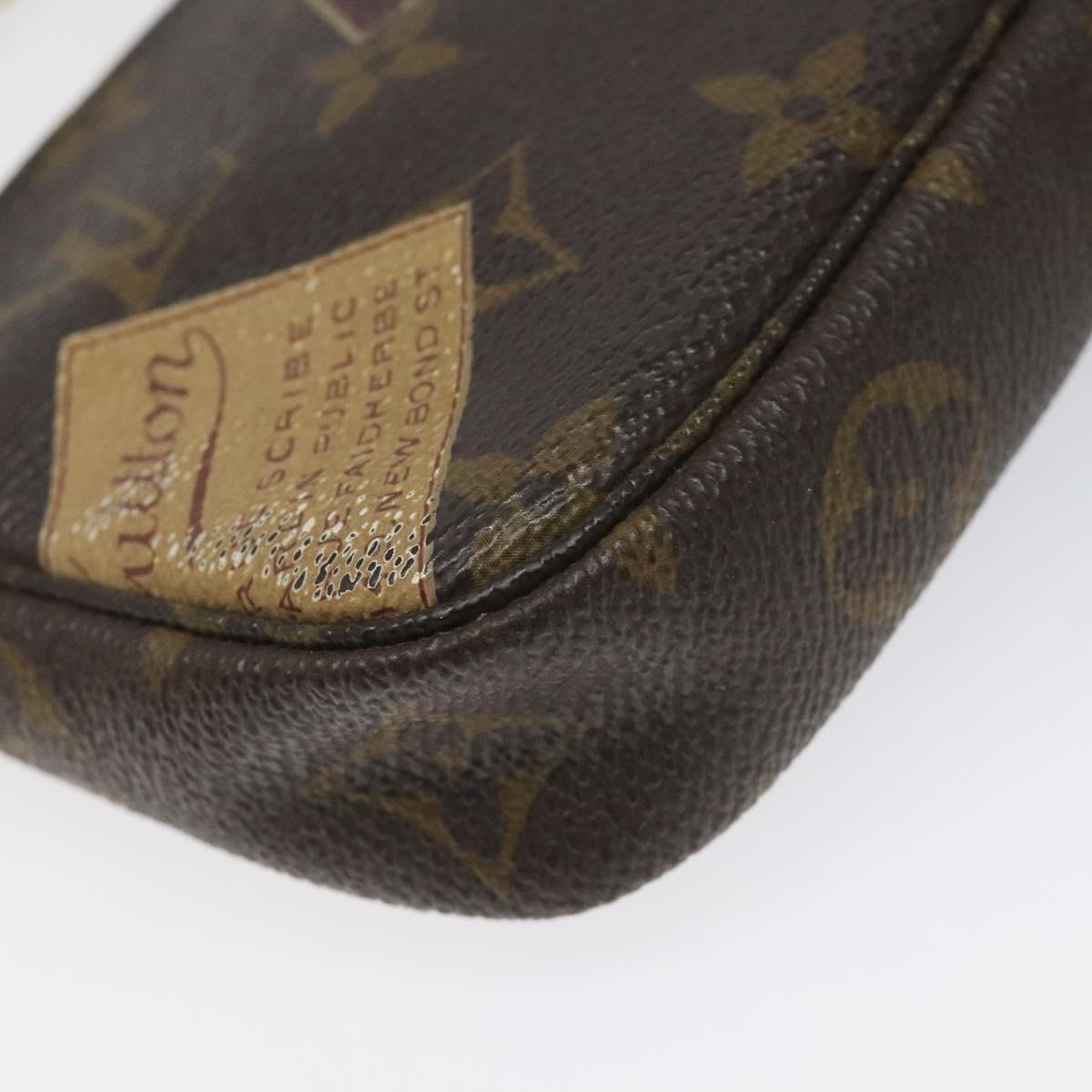 Louis Vuitton Mini Pochette Accessoires Brown Canvas Clutch Bag (Pre-Owned)