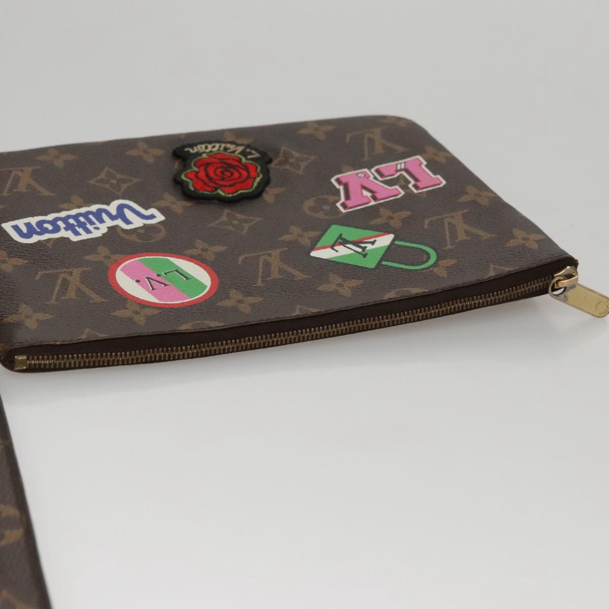 Louis Vuitton City Brown Canvas Clutch Bag (Pre-Owned)