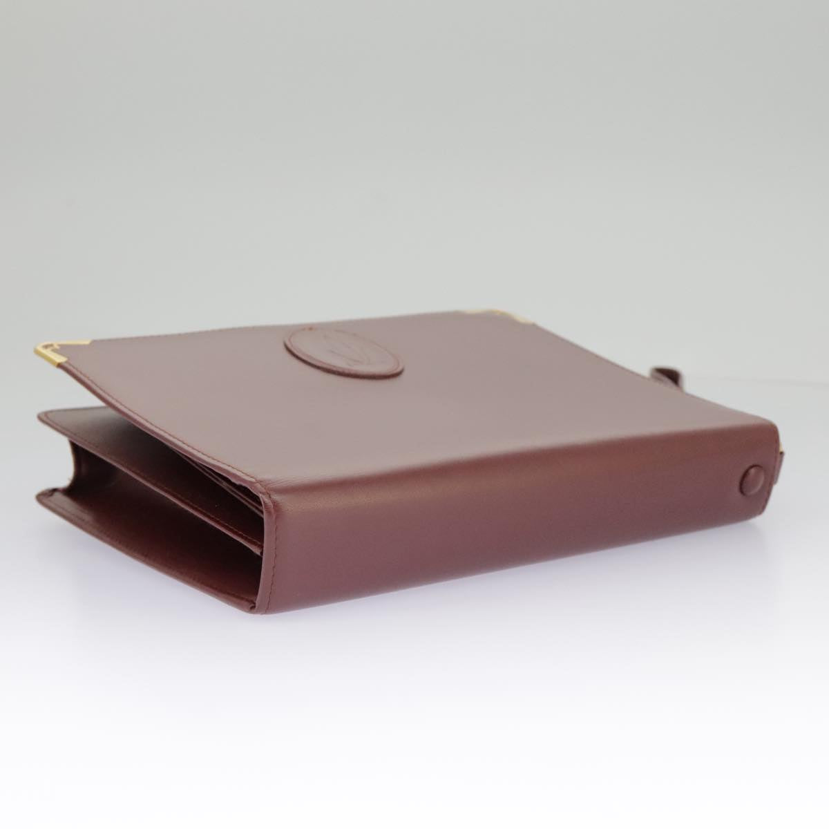 Cartier Must De Cartier Burgundy Leather Clutch Bag (Pre-Owned)