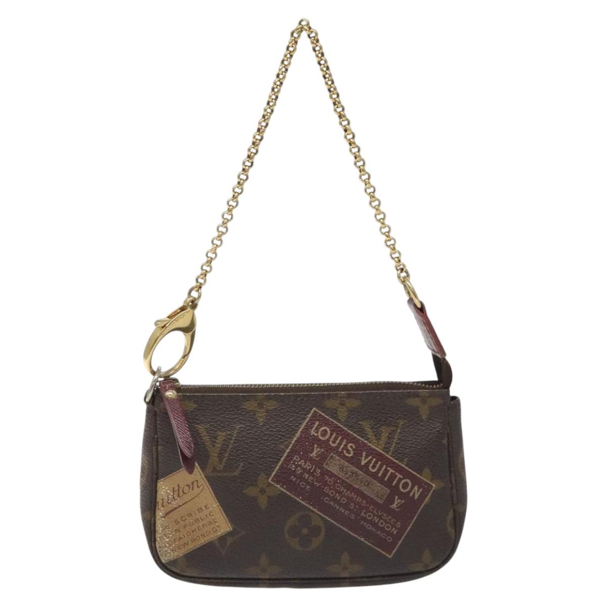 Louis Vuitton Mini Pochette Accessoires Brown Canvas Clutch Bag (Pre-Owned)