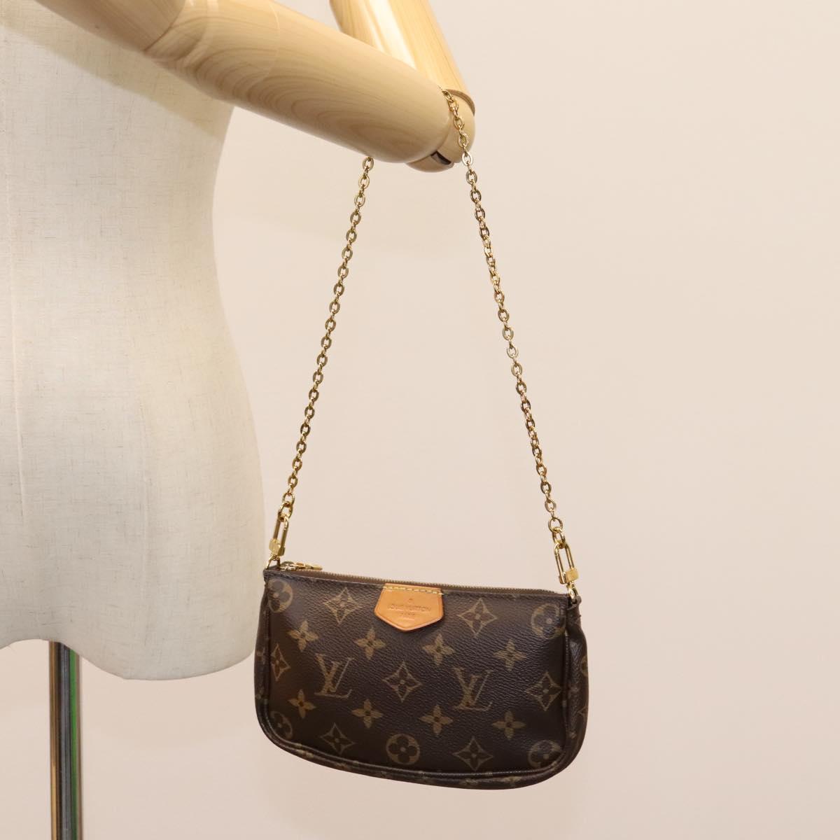 Louis Vuitton Multi Pochette Accessoires Brown Canvas Clutch Bag (Pre-Owned)