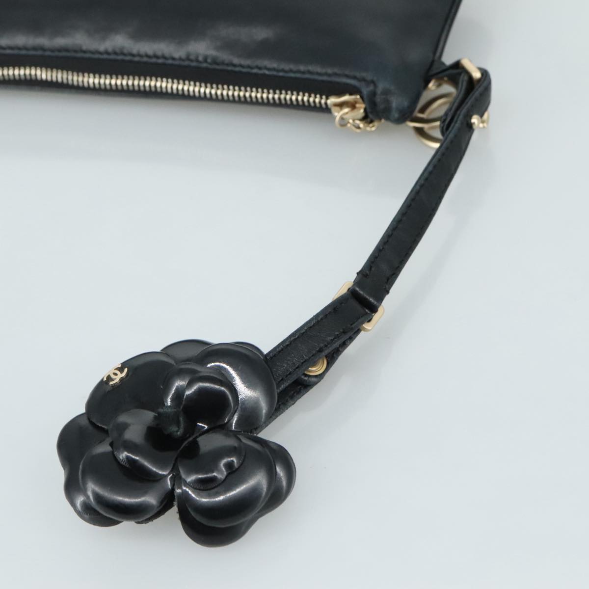 Chanel Camélia Black Leather Clutch Bag (Pre-Owned)