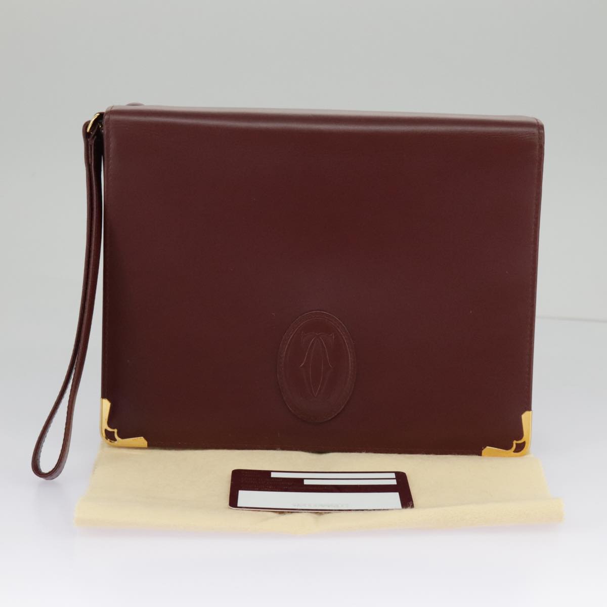 Cartier Must De Cartier Burgundy Leather Clutch Bag (Pre-Owned)