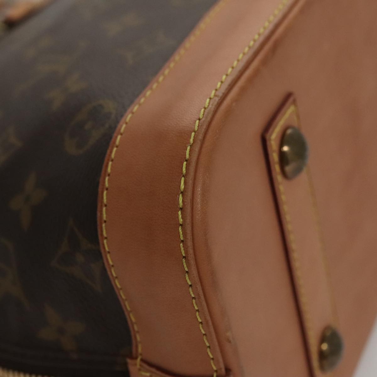 Louis Vuitton Alma Brown Canvas Handbag (Pre-Owned)