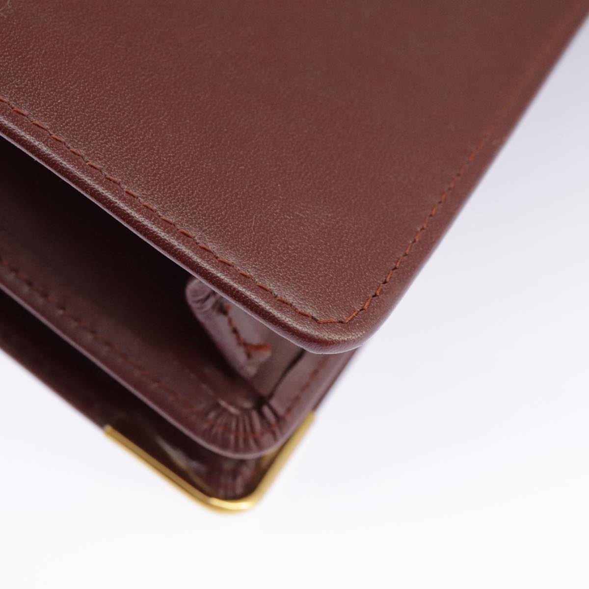 Cartier Must De Cartier Burgundy Leather Clutch Bag (Pre-Owned)