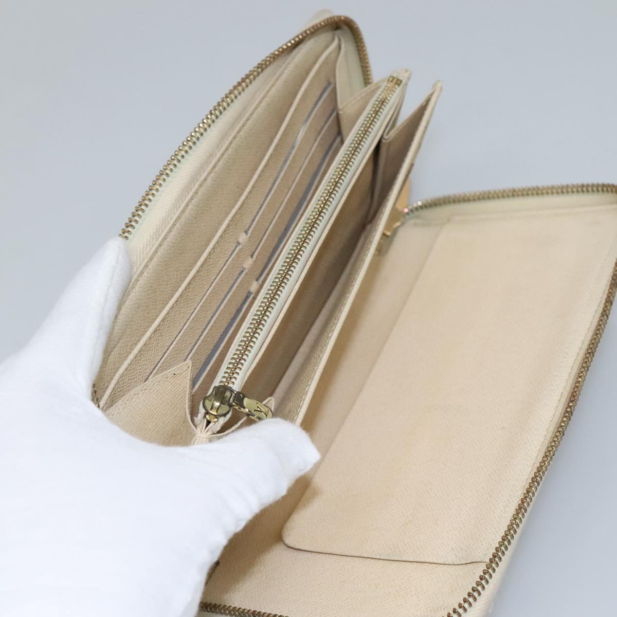 Louis Vuitton Zippy Organizer White Canvas Wallet (Pre-Owned)
